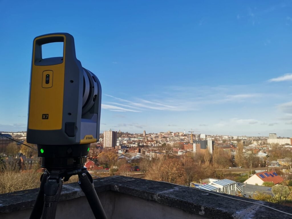 Laser scanning survey using Trimble X7 scanner capturing measured building survey data overlooking London city