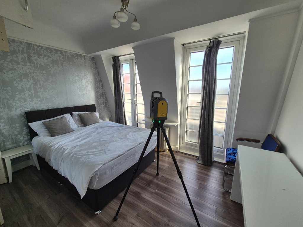 Trimble X7 laser scanner in bedroom during measured building survey