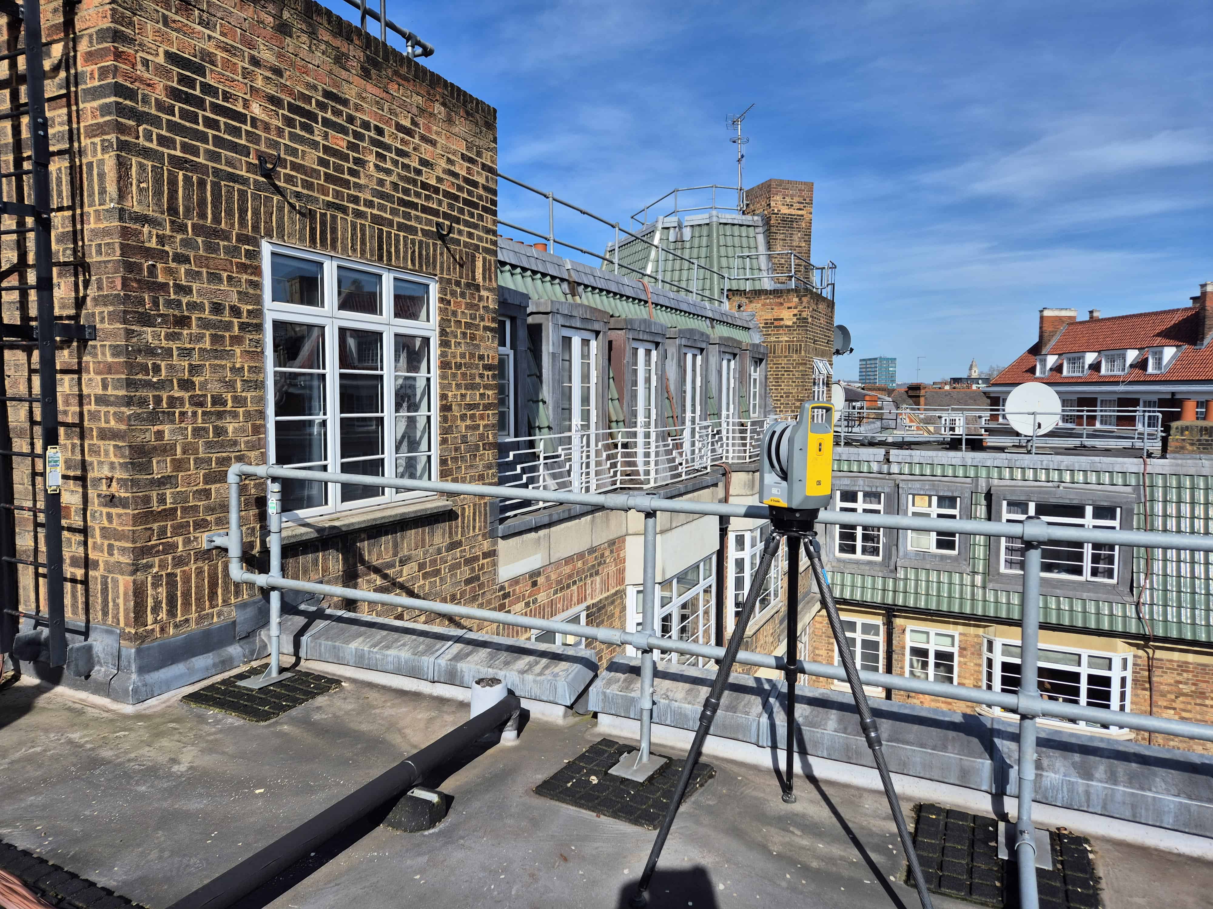 Trimble X7 laser scanner on rooftop terrace during measured building survey London