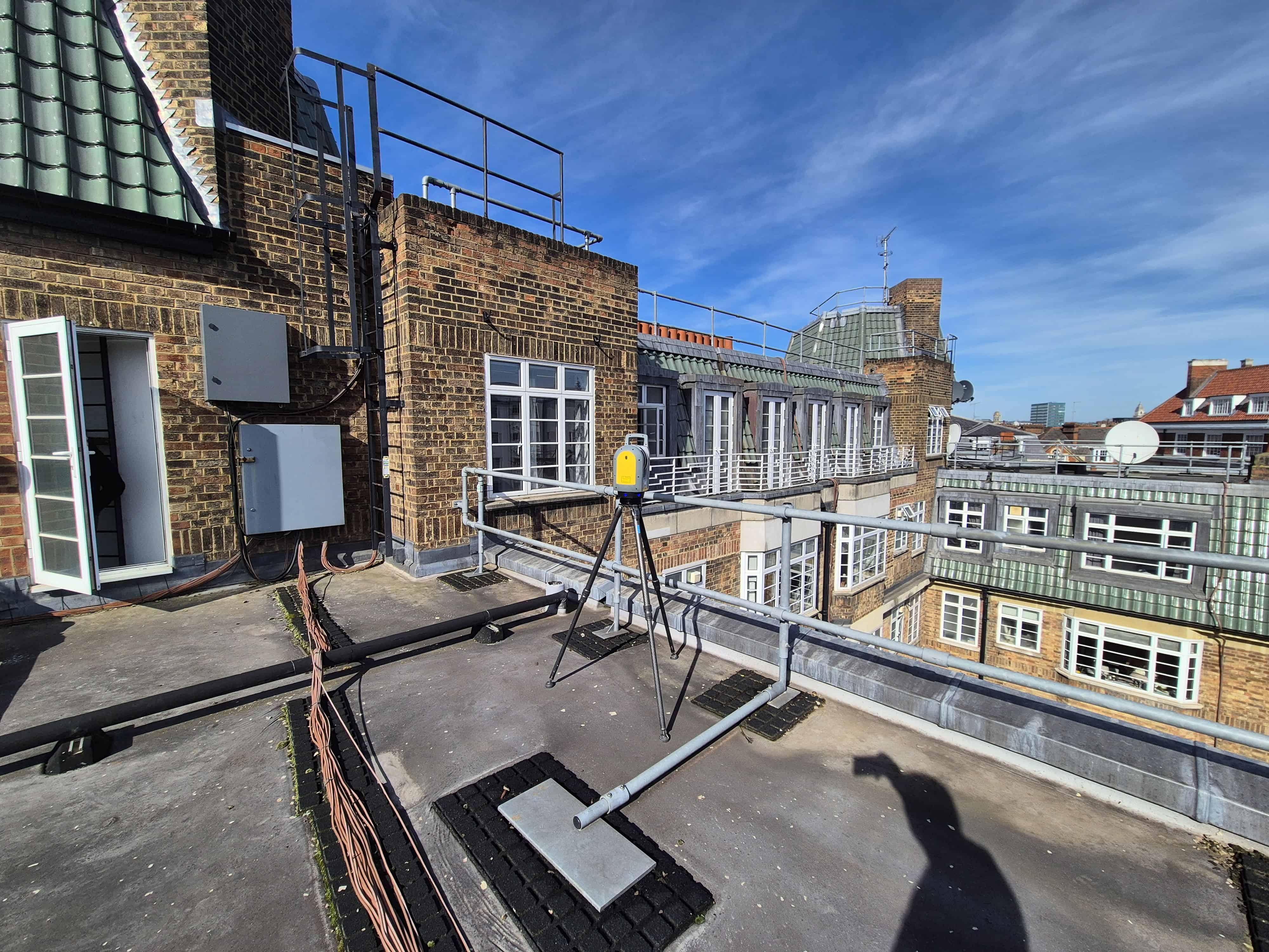 Trimble X7 laser scanner on flat roof during measured building survey