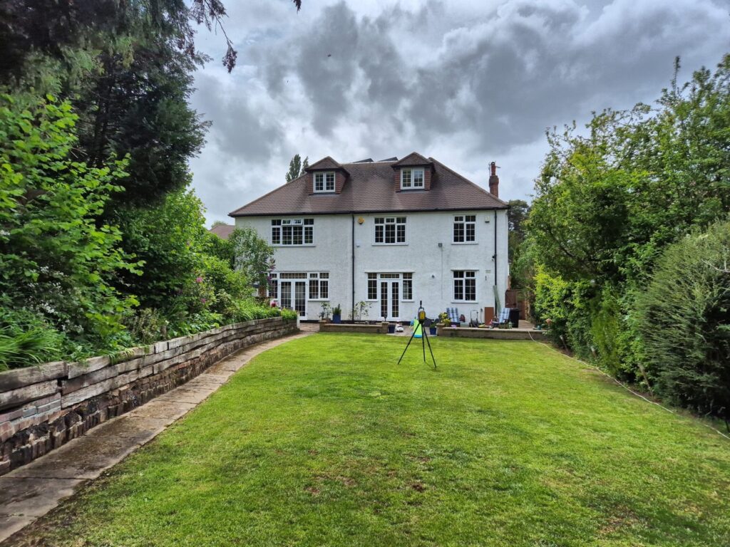 Trimble X7 laser scanner set up in rear garden during measured building survey, Orpington BR6