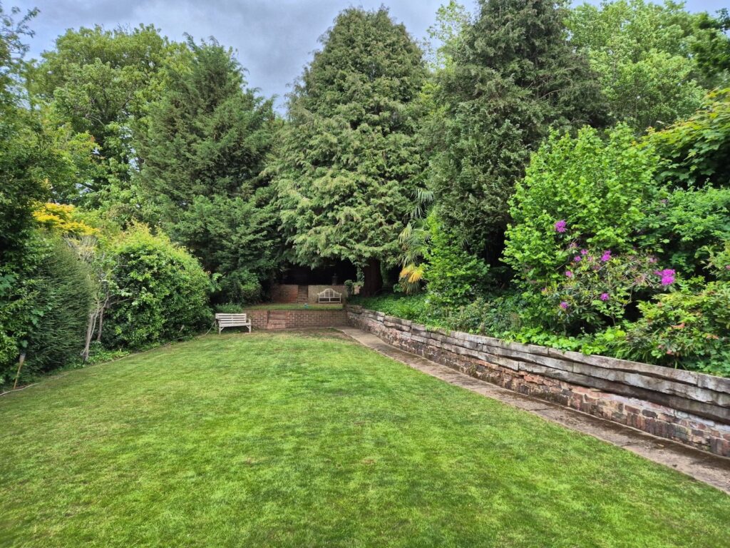 Trimble X7 laser scanner set up in rear garden during measured building survey, Orpington BR6