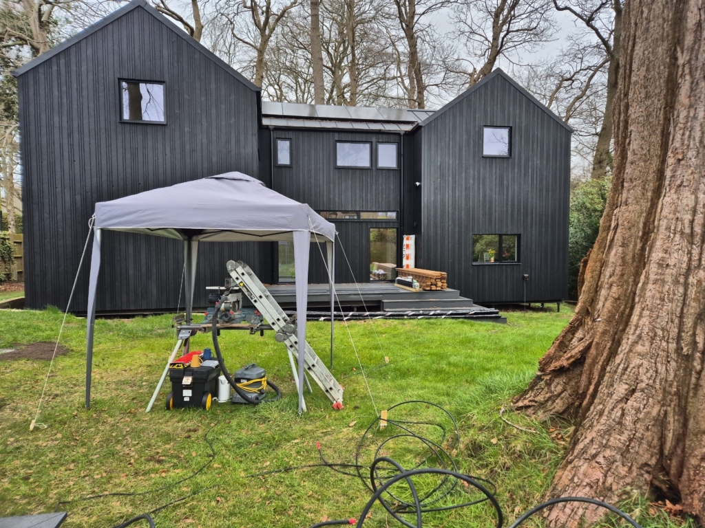 Rear elevation of Woodland House with new decking and timber cladding, Tunbridge Wells TN2 — 360 Measurements